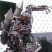 chinese designers, chinese metal work factory, Jiang Chen, megatron tank, Recycled Materials, recycled metal sculptures, scrap metal, scrap metal sculptures, scrap metals, transformer sculptures, transformers megatron tank, wing wah metal crafts factory, wing wah sculptures, Yang Junlin, optimus prime, transformers, megatron, bumblebee