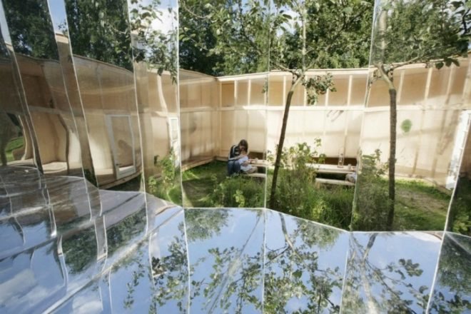 archive, pavilion for an artist, dhl architecture, shiny exterior, compact space, temporary pavilion