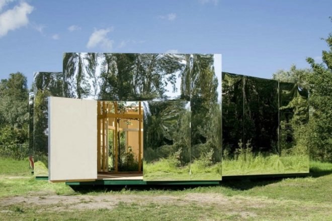 archive, pavilion for an artist, dhl architecture, shiny exterior, compact space, temporary pavilion