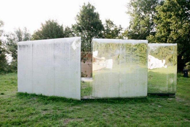 archive, pavilion for an artist, dhl architecture, shiny exterior, compact space, temporary pavilion