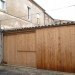 urban green studio conversion, built in rooms, FABRE/deMARIEN architectes,russian green buildign, garage convertion, eco convertion, wooden rolling shutters,