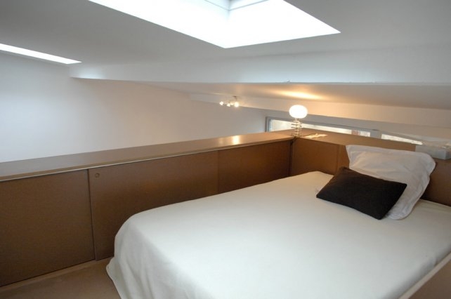 urban green studio conversion, built in rooms, FABRE/deMARIEN architectes,russian green buildign, garage convertion, eco convertion, wooden rolling shutters,