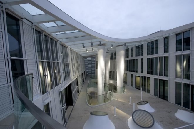 Markthäuser, Rebstockplatz, green atrium design, Urban renewal, terracotta facade, strip building facade, day lit central atrum, Mainz green building, Studio Fuksas, eco mixed use, German urban green design,