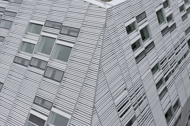 Markthäuser, Rebstockplatz, green atrium design, Urban renewal, terracotta facade, strip building facade, day lit central atrum, Mainz green building, Studio Fuksas, eco mixed use, German urban green design,