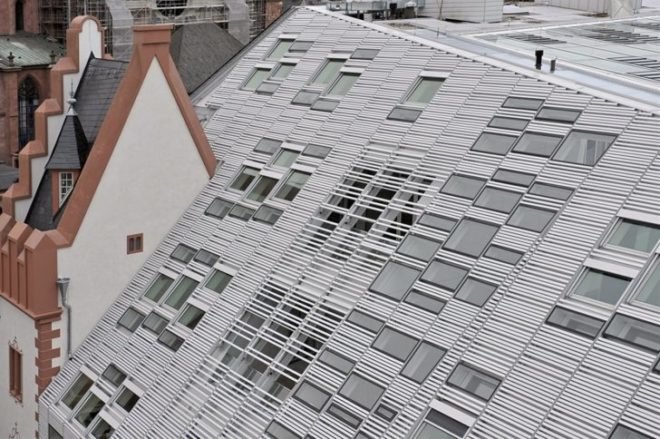 Markthäuser, Rebstockplatz, green atrium design, Urban renewal, terracotta facade, strip building facade, day lit central atrum, Mainz green building, Studio Fuksas, eco mixed use, German urban green design,