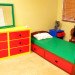 Nathan Sawaya, lego bedroom, bedroom made of legos, bedroom set made of legos, brick artist, lego art, lego artist, sustainable design, green design, lego sculptures, green art, eco art, sustainable art, lego bike, lego cello