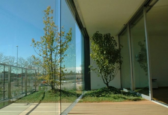 Milanofiori Housing Complex, OBR, greenhouse, solar passive design, gardens, milan, apartment complex