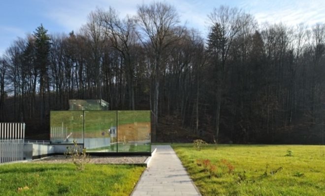 API Arhitekti, eco parking lot, green parking lot, underground parking, environmentally sensitive parking lot, green roof parking lot, minimalist parking lot, Slovenia green building,