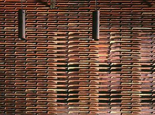 Warehouse 8B is An Avant Garde Office Made From Recycled Roof Shingles