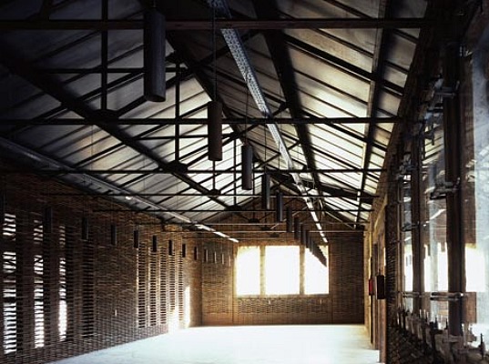 Warehouse 8B is An Avant Garde Office Made From Recycled Roof Shingles