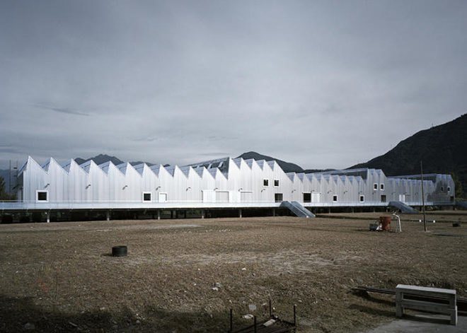 green design, eco design, sustainable design, Gordola, Switzerland, Durisch Nolli, SSIC Complex, mountains, stilted building, sawtooth roof, skylight