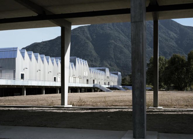 green design, eco design, sustainable design, Gordola, Switzerland, Durisch Nolli, SSIC Complex, mountains, stilted building, sawtooth roof, skylight