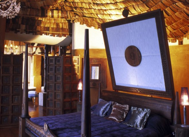 Ngorongoro Crater Lodge, Ngorongoro, eco tourism, hotel built into crater wall, hotel built into volcano wall, eco travel, green design, eco design, sustainable design,
