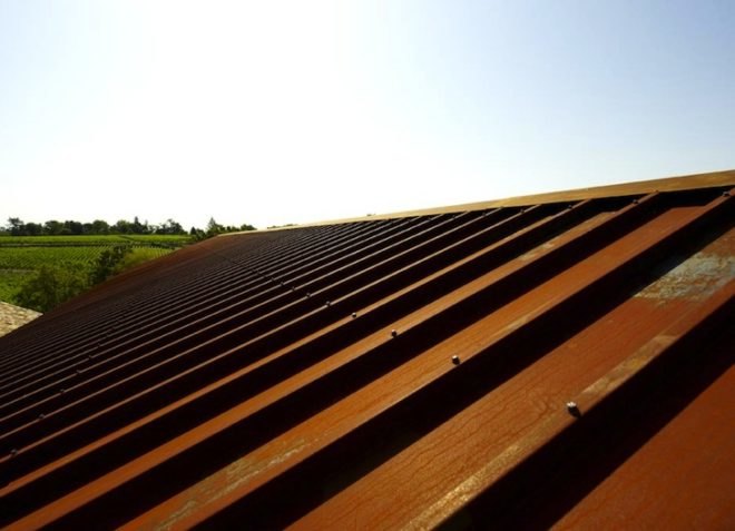 wind turbine, green roof, minimalism, renovation, sustainable upgrade, UNESCO, world heritage site, thermal mass, Corten steel, historic landscape, green building, green design, sustainable design, eco-design, Nadau Lavergne Architects