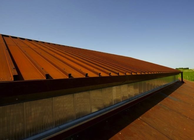 wind turbine, green roof, minimalism, renovation, sustainable upgrade, UNESCO, world heritage site, thermal mass, Corten steel, historic landscape, green building, green design, sustainable design, eco-design, Nadau Lavergne Architects