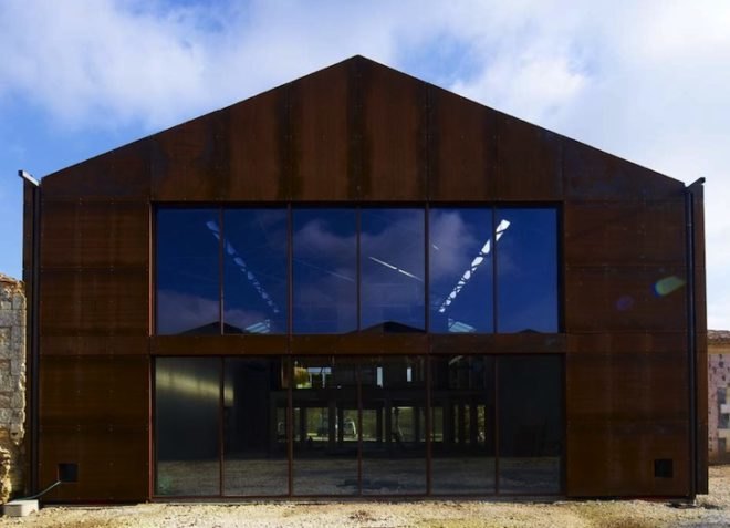 wind turbine, green roof, minimalism, renovation, sustainable upgrade, UNESCO, world heritage site, thermal mass, Corten steel, historic landscape, green building, green design, sustainable design, eco-design, Nadau Lavergne Architects