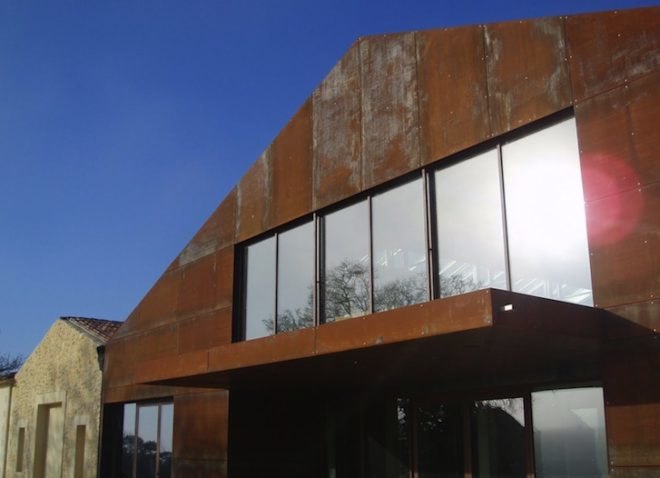 wind turbine, green roof, minimalism, renovation, sustainable upgrade, UNESCO, world heritage site, thermal mass, Corten steel, historic landscape, green building, green design, sustainable design, eco-design, Nadau Lavergne Architects