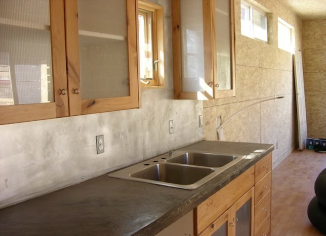 rammed earth, clay, passive design, solar water heater, solar panels, southern exposure, solar gain, glazing, Design Build Bluff, Utah, Navajo, Suzie Whitehorse, natural cooling, natural ventilation