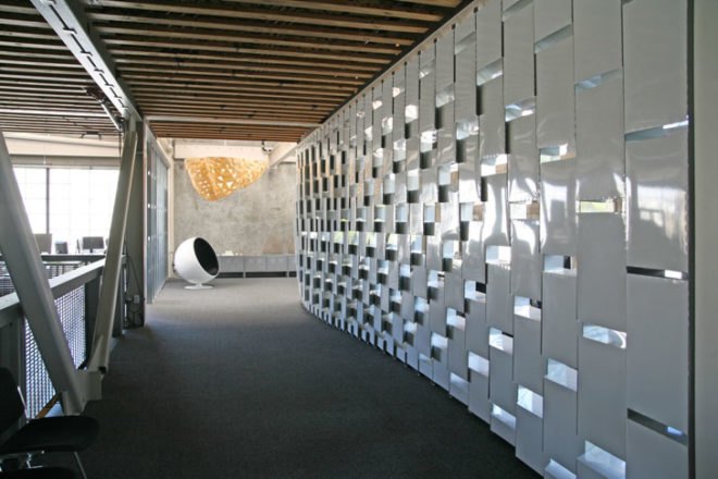 green design, eco design, sustainable design, IwamotoScott, Obscura Digital, warehouse redesign, recycled metal, black bamboo, Bookcaseshelfwall
