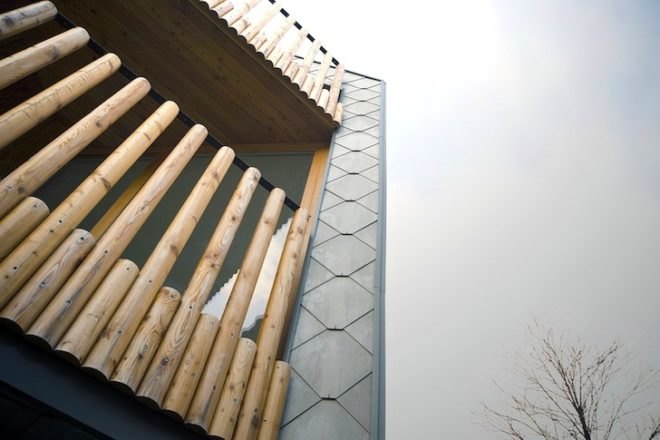 scalloped skin, alpine, slovenia, ski complex, ski apartments, OFIS, OFIS arhitekti, vernacular architecture, local tradition, local architecture, green building, green design, sustainable design, eco design