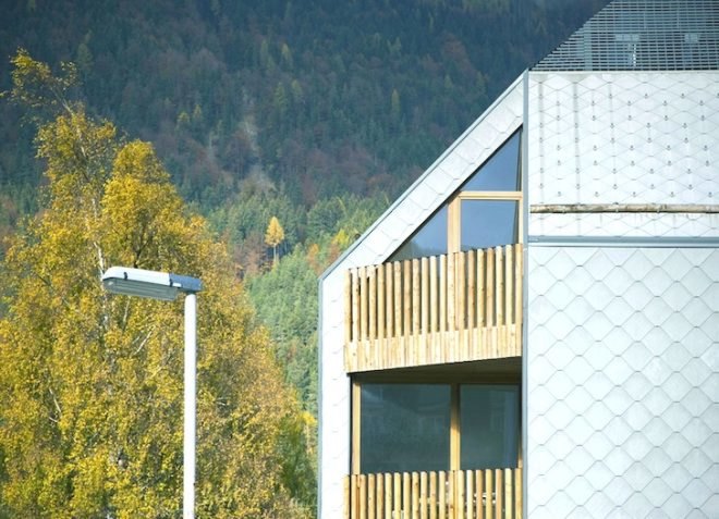 scalloped skin, alpine, slovenia, ski complex, ski apartments, OFIS, OFIS arhitekti, vernacular architecture, local tradition, local architecture, green building, green design, sustainable design, eco design
