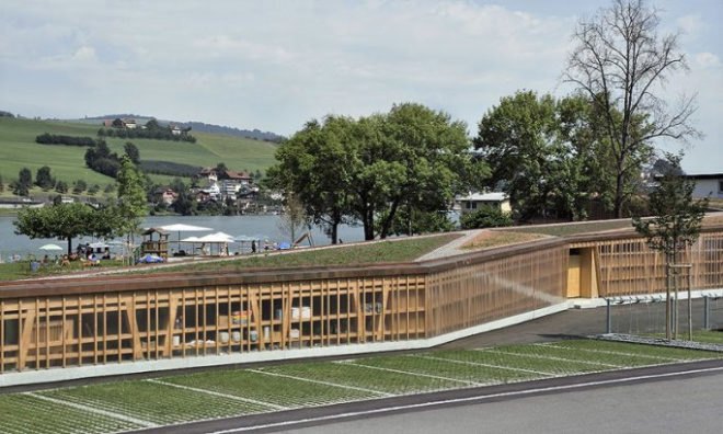 eco design, Green Building, green building design, green roof, Swiss green building, translucent skin, transparent building skin, vegetated roof, wooden building design