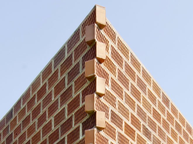 green design, eco design, sustainable design, Barcelona, House 712, H Arquitectes, perforated brick, triangular building, natural ventilation, minimalist architecture