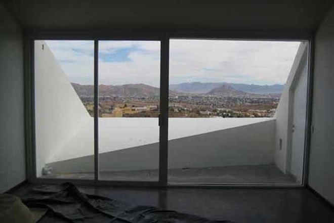 Sustainable Building,Renewable Energy,green Interiors,Architecture,mexico,chihuahua desert,sloping roofs,soil thermal mass,concrete house,productora,terraces,energy optimisation,natural light,minimal decoration,buried house
