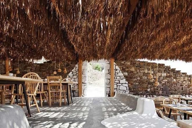 green roof,Green Materials,Green Lighting,green Interiors,Eco Travel,Architecture,pumpking lights,reed roof,greece,mykonos,seaside restaurant,Cycladic Architecture,lime white,locally sourced materials,local stones