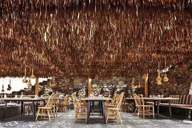 green roof,Green Materials,Green Lighting,green Interiors,Eco Travel,Architecture,pumpking lights,reed roof,greece,mykonos,seaside restaurant,Cycladic Architecture,lime white,locally sourced materials,local stones