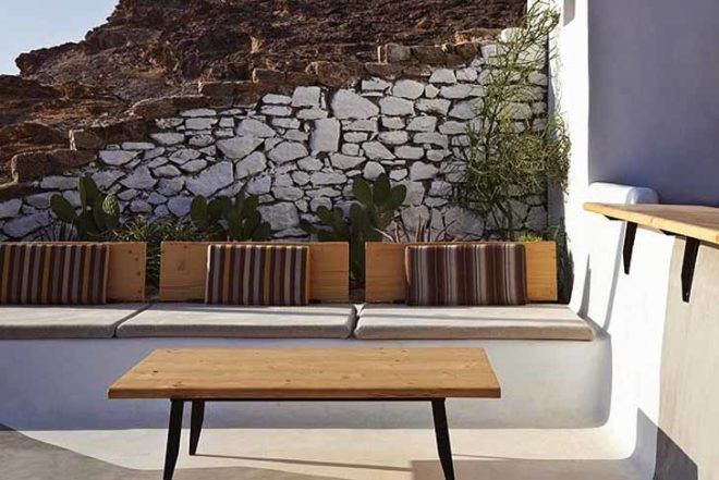 green roof,Green Materials,Green Lighting,green Interiors,Eco Travel,Architecture,pumpking lights,reed roof,greece,mykonos,seaside restaurant,Cycladic Architecture,lime white,locally sourced materials,local stones