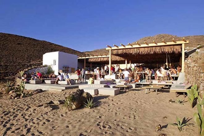 green roof,Green Materials,Green Lighting,green Interiors,Eco Travel,Architecture,pumpking lights,reed roof,greece,mykonos,seaside restaurant,Cycladic Architecture,lime white,locally sourced materials,local stones