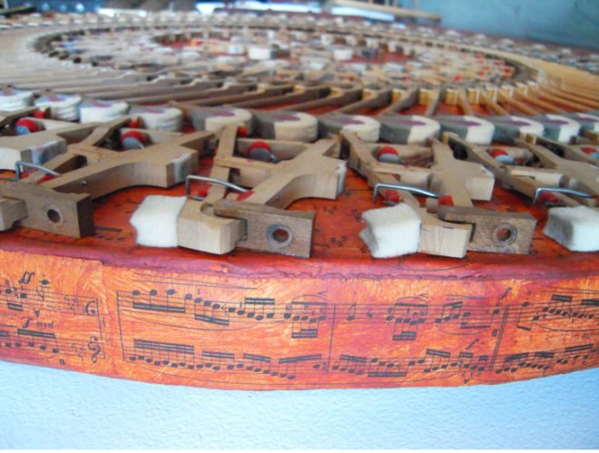 steinway mandala, carol cole, eco art, green art, recycled materials, piano art, piano key art, mandala, sustainable design, green design, steinway piano, green sculpture, music art