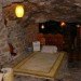 Arizona cave, Arizona green home, cave architecture, cave for sale, cave house, cave house design, eco home, green home, house blasted into hill, house cave, natural cooling, natural pool, rock house, underground home