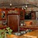 Arizona cave, Arizona green home, cave architecture, cave for sale, cave house, cave house design, eco home, green home, house blasted into hill, house cave, natural cooling, natural pool, rock house, underground home