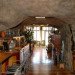 Arizona cave, Arizona green home, cave architecture, cave for sale, cave house, cave house design, eco home, green home, house blasted into hill, house cave, natural cooling, natural pool, rock house, underground home