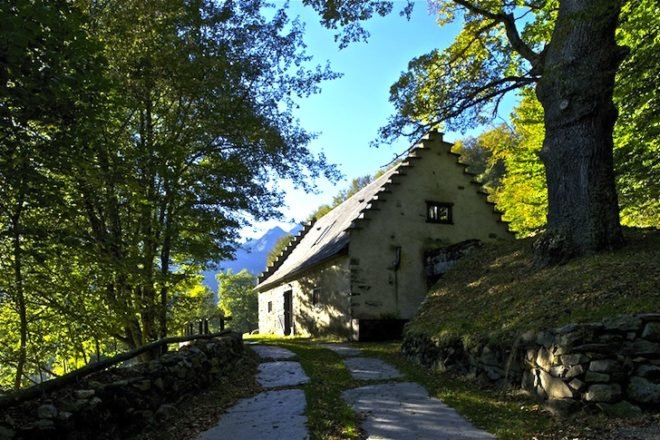 adaptive reuse, retaining wall, green design, sustainable design, Lesponne River, France, Pyrenees Mountains, eco-design, green roof, renovation, barn extension, PPA Architects, natural materials, stone, daylighting, eco-design