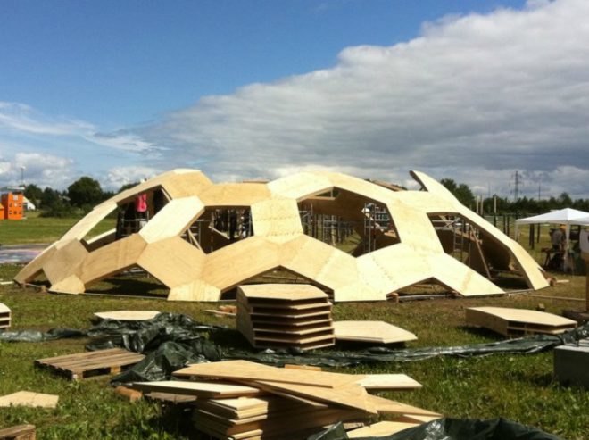 geodesic dome, roskilde festival, Kristoffer Tejlgaard, Henrik Almegaard, danish design, hexagon lattice, plywood hexagons, interconnected shapes, reused structure