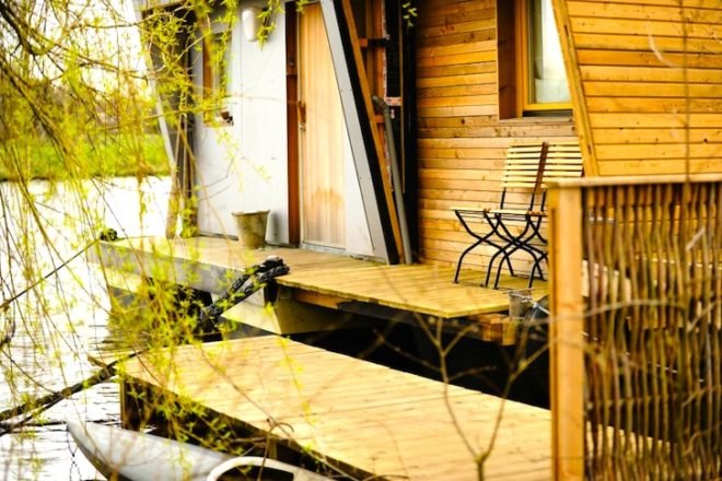 Silverbeaver, Hausboot, house boat, floating home, Confused Direction, Confused Direction Design, Germany, sustainable boat house, green design, sustainable design, eco design, daylighting, energy efficiency, small footprint, locally-sourced materials, green materials, oldenburg, hunt river, resopal, resofloor, insulation, Bullerjan Oven