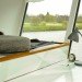 Silverbeaver, Hausboot, house boat, floating home, Confused Direction, Confused Direction Design, Germany, sustainable boat house, green design, sustainable design, eco design, daylighting, energy efficiency, small footprint, locally-sourced materials, green materials, oldenburg, hunt river, resopal, resofloor, insulation, Bullerjan Oven