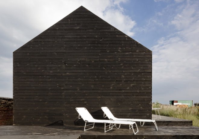 green design, eco design, sustainable design, Adaptive reuse, Carl Turner Architects, Ochre Barn, Stealth Barn, Converted Ban, glass doors, Norfolk, England, Oriented Strand Board
