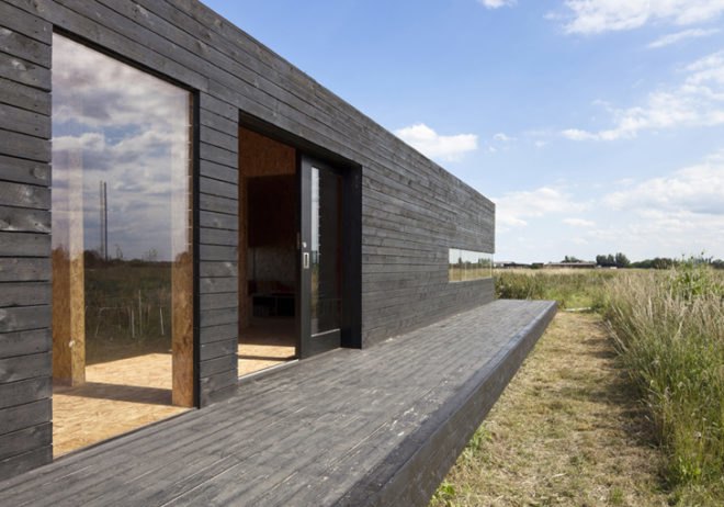 green design, eco design, sustainable design, Adaptive reuse, Carl Turner Architects, Ochre Barn, Stealth Barn, Converted Ban, glass doors, Norfolk, England, Oriented Strand Board