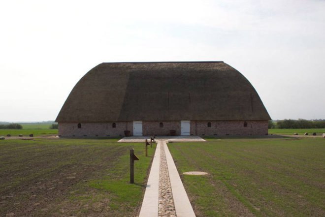Danish design, barn, recycled barn, refurbished barn, Praksis, terrazzo floor, red-bricked wall, biodegradable roof, straw roof, thatched roof, flexible space, exhibitions space, curved wooden walls, denmark