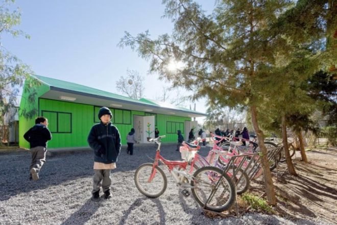 LAND Arquitectos, green schools, Chile, Santiago, Long-lasting materials, affordable materials, insulation, ventilation, Fluorescent Green Shelters, prefab architecture, Daylighting