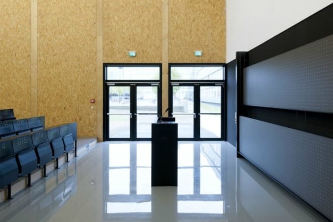Deubzer Konig Rimmel Architekten, interims audimax, munich's technical university, undulating surface, germany lecture hall, wooden lecture theater, sustainable wooden design, green design, spruce architecture