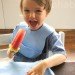 Strawberry Popsicle, kid eating popsicle, child eating popsicle, diy popsicle, how to popsicle recipes, strawberry popsicle recipe, make your own popsicles at home, healthy popsicles