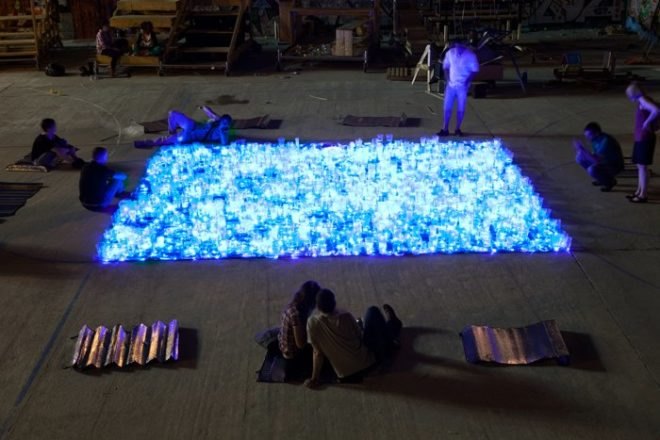 luzinterruptus, public installation, madrid intervention, recycled materials, reused containers, plaza de la cebada, public artwork, community art, sustainable art