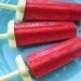 Red popsicles on a blue plate