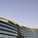 Enzo Ferrari Museum, facade, Ferarri, italy, cars, automobile, yellow, modern, photovoltaic, geothermal, flashy, bold, windows, energy savings, funky