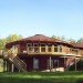 wraparound deck around round house, two story round home, icf built house, circle house